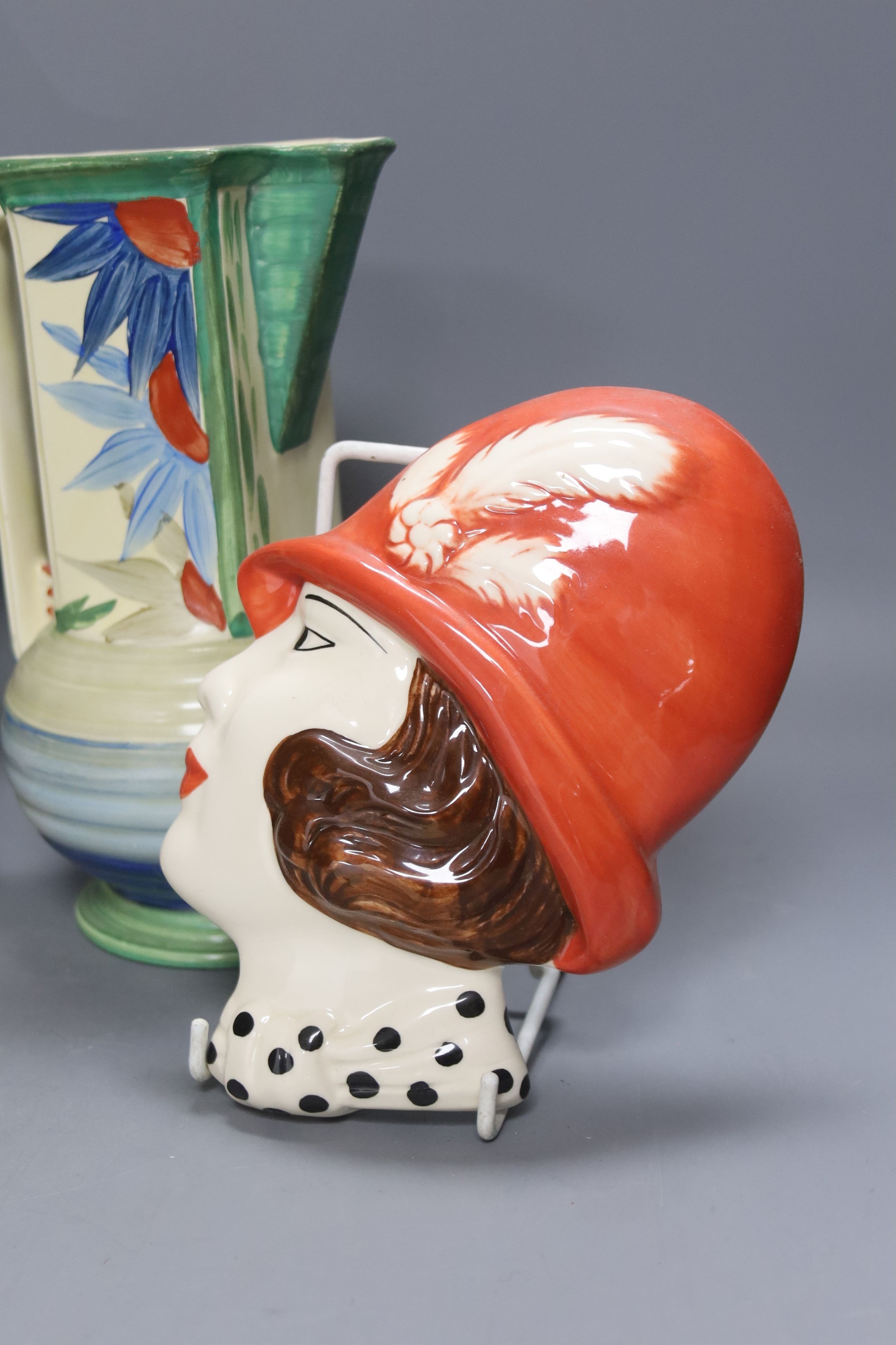 An Art Deco style jug and vase, wall mask and Crown Devon dish